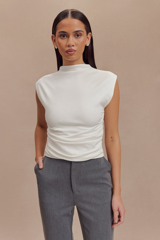 Top Ellia à col montant et sans manches - Blanc