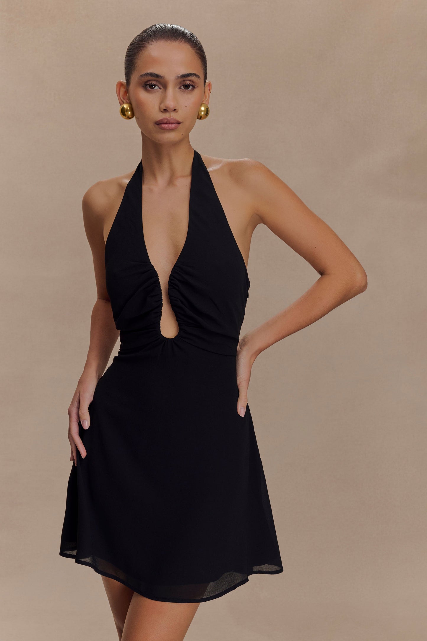 Mini-robe Malakhai en mousseline de soie avec décolleté halter - Noir