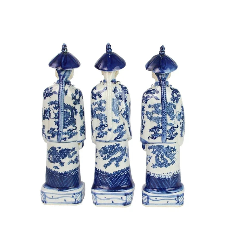 Trio d'empereurs debout de taille moyenne en bleu et blanc