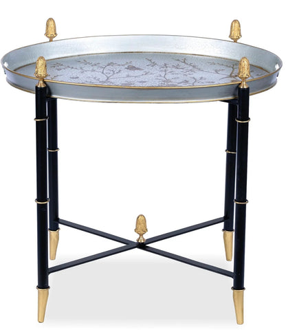 Table ronde en étain noir avec embouts dorés