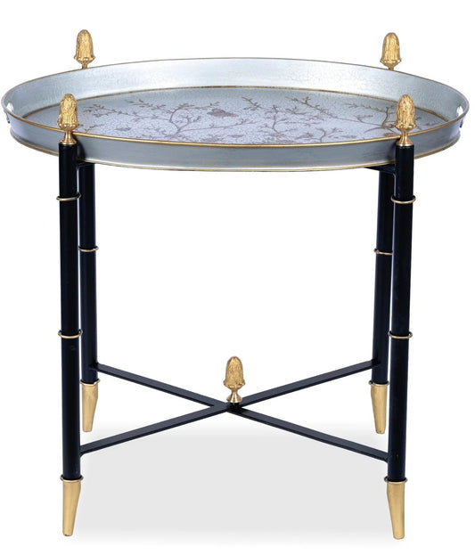 Table ronde en étain noir avec embouts dorés